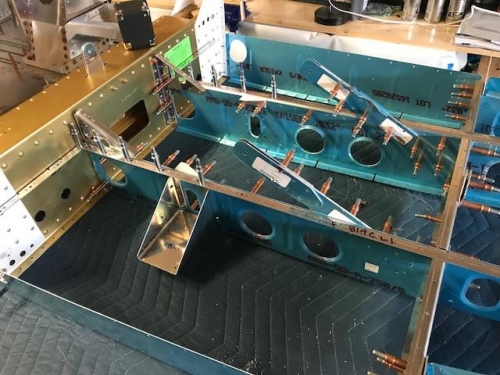 Aileron trim bracket on left side.  I removed the survo once I confirmed alignment