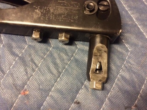 Hand riveter, modified for access to the pop rivets on the bracket attachement