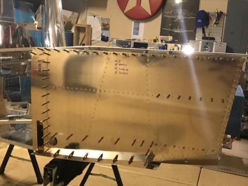 Left side skin with rivets for arm rest