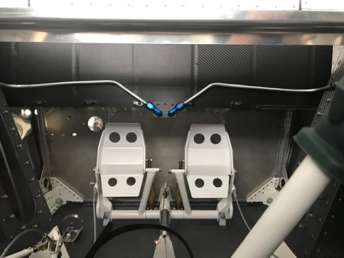 Brake lines in front of the lower rib assembly that I wrapped in black graphite vinyl