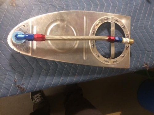 Right fuel tank rib showing flop tube fuel line and anti-obstruction bracket