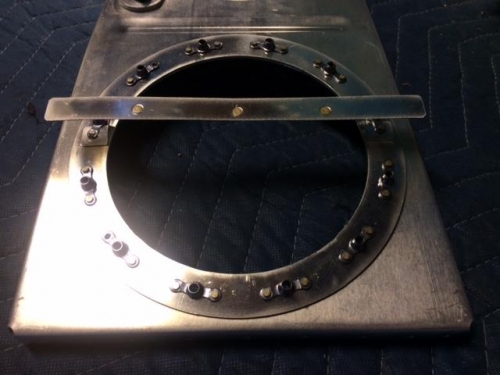 Riveted on a thin piece of aluminum for an anti-obstruction clocker