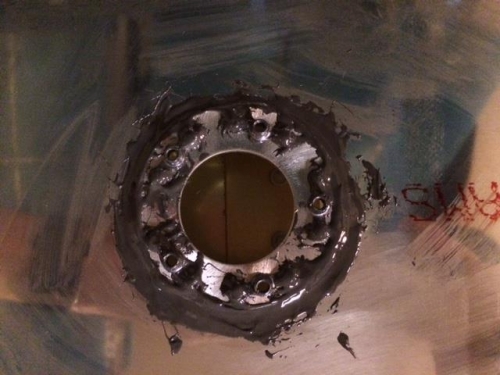 Inside tank position of the doubler plate sealed into place with nutplates