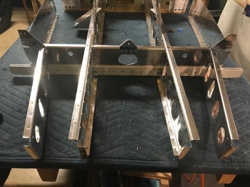 Bulkhead assembly with the inbound left and right (forward and aft) ribs riveted to bulkhead