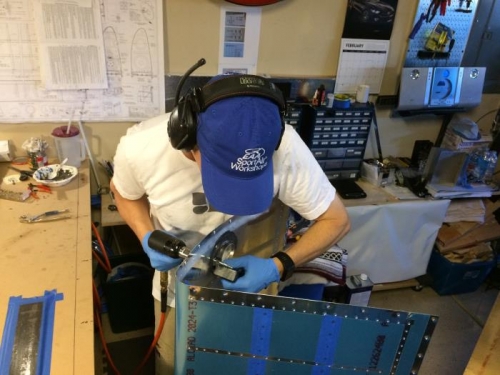 Riveting filler necks