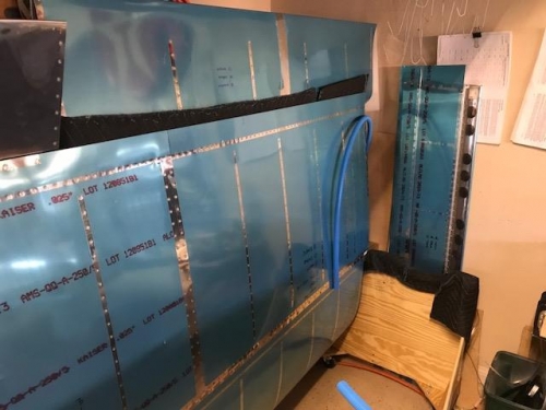 Left Flap sitting on the wing and  Left flap resting against the wall