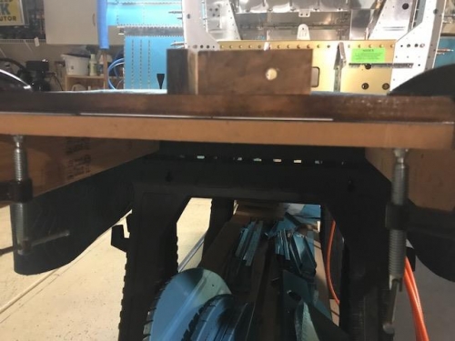 Clamped hardwood for bending radius on web enclosures