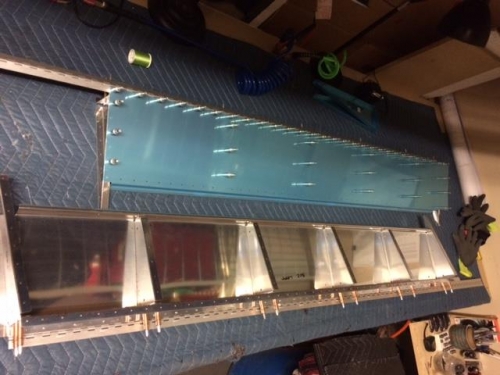 Top of left flap and bottom skin for right