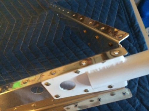 Lower rib and elevator horne riveted to spar