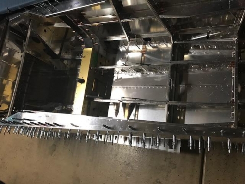 Left side rail, clamped, drilled, and clecoed