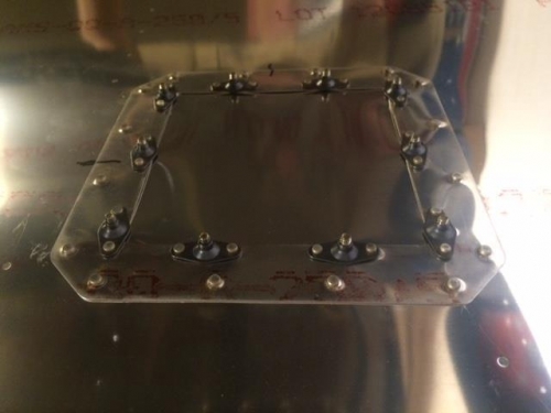 back side of left leading edge skin access door