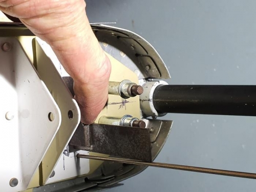 Hole not drilled straight.