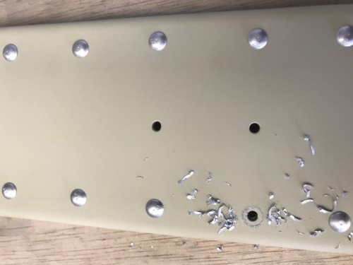 Rivet removed