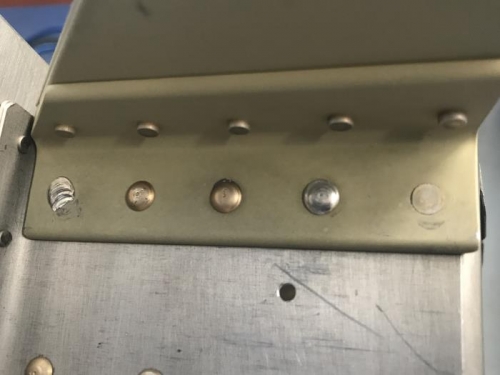 Damaged rivet which needs to be removed