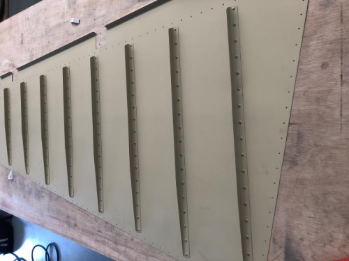 Stiffner and skin back riveted