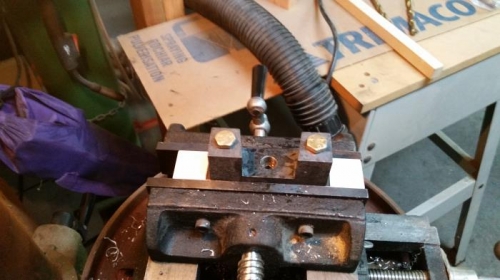 Drilling wear plate on drill press