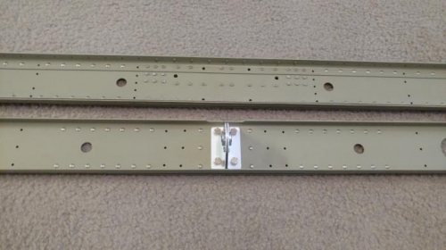 Front spar with stringers (top), aft spar with elevator bracket (bottom)