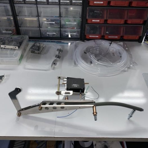 Trim tab servo assembly