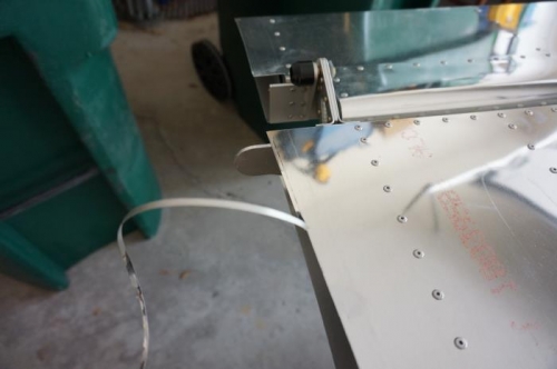 Trimming inboard edge of wing skins