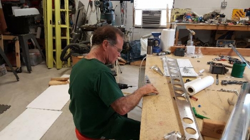 Deburing the holes in the rudder parts