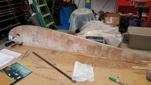 Inboard tensioning rib