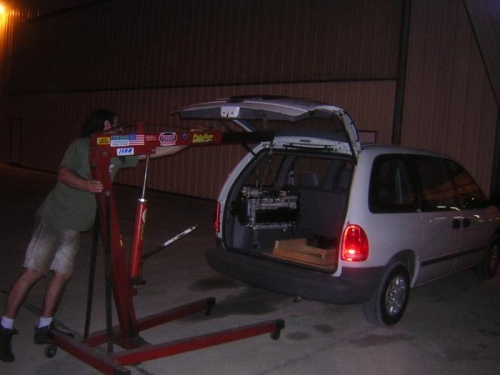 Kevin placing the finished engine into my van