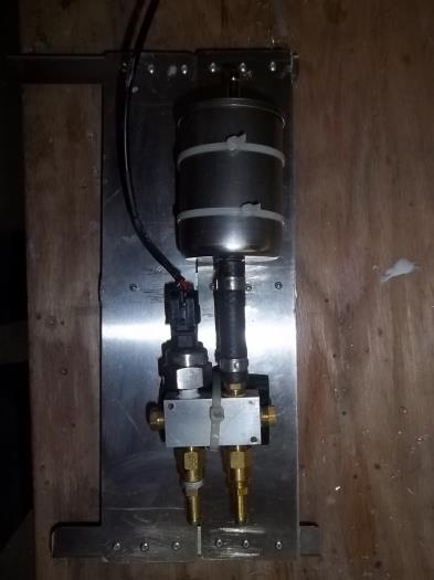 Filter, check valve, pressure sensor assembly