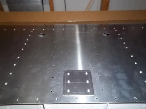 Strike plate and inspection holes