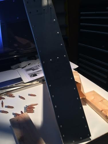 Rivets to the outside of the spar