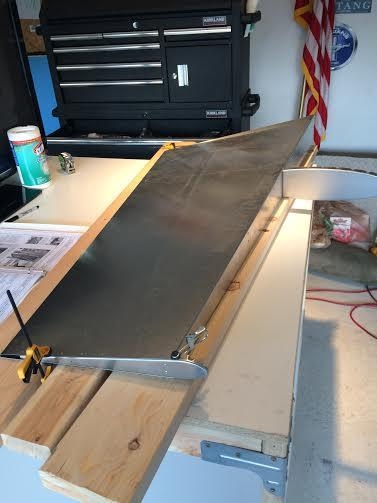 test fitting the skin after riveting the ribs to the spar