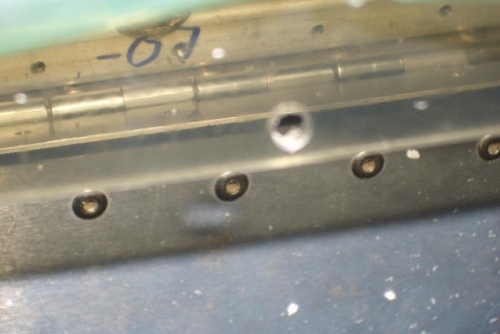 Hole close bottom edge