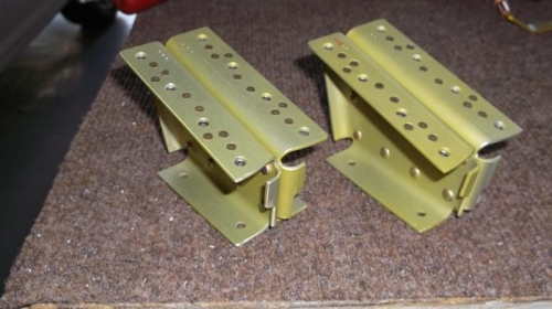 Mid seat support brackets