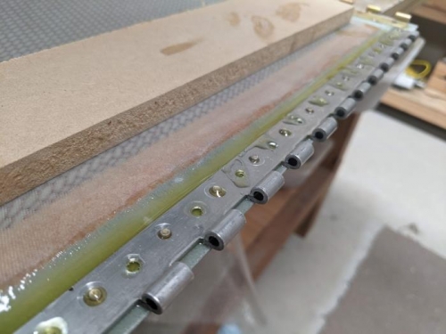 Careful not to get excess resin between the hinge pin holes