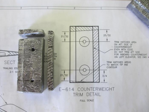 One of the lead counterweights, trimmed to fit inside the elevator rib