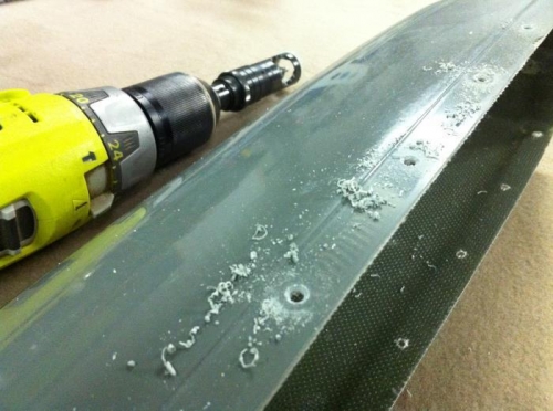 Machine countersinking the fibreglass tip rivet holes