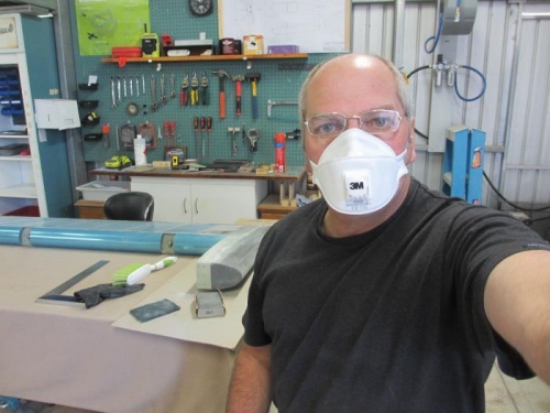 The dust mask is a must when sanding