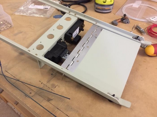 Assembling my custom mounting panel on the bench