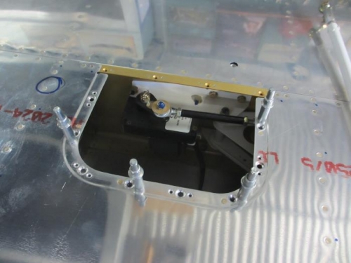 Fitting nutplates to one of the three inspection hatches