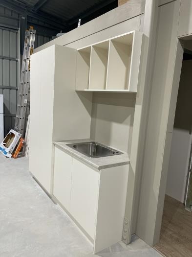 Utility cabinet, installed hangar side (ie: wash your grubby hands before entering Pilot's  Quarters)