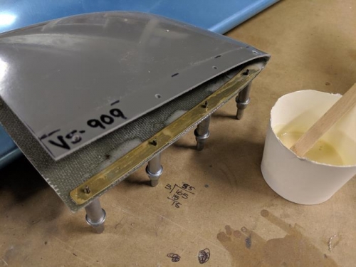Strengthening the vertical stabiliser fibreglass tip, so the rivets don't pull though