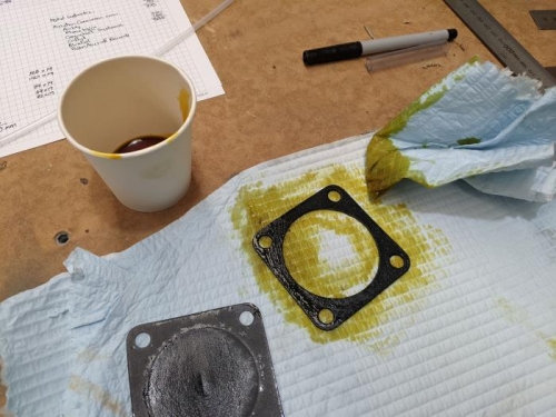 Applying light oil to the gaskets