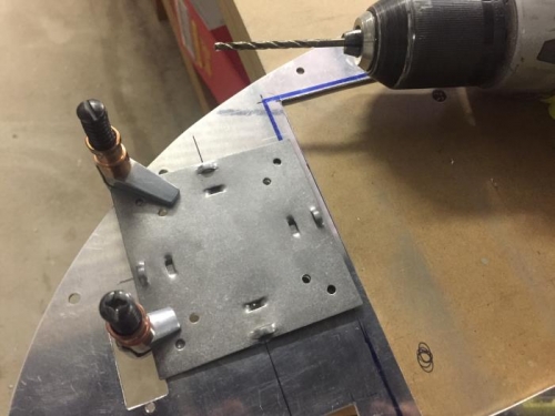 Using the template to precisely drill the instrument mounting holes