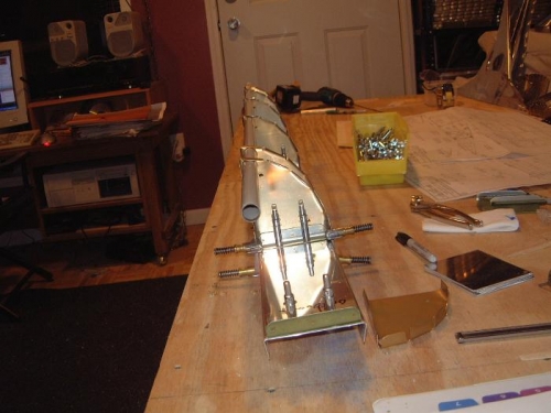 Simulated skin/attaching aileron nose ribs