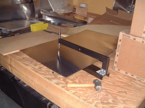 Fuel tank cover dimpling.