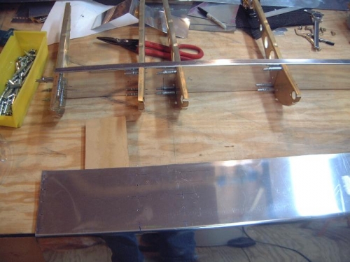 predrilling bottom of aileron nose skin