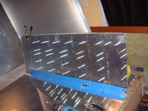 Re-drilling the 3rd left skin.