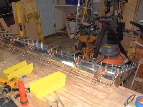 Left flap hinge cutouts