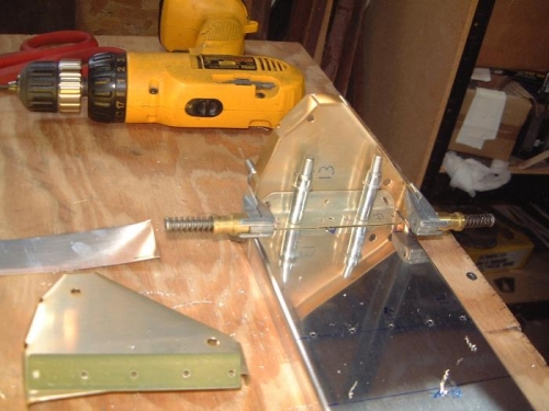 Fitting nose rib to flap spar with simulated skin.