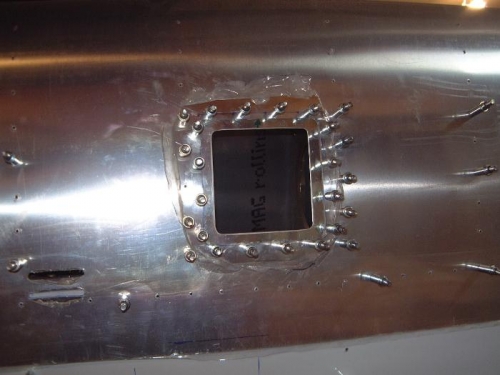 Inspection hole ring in place.