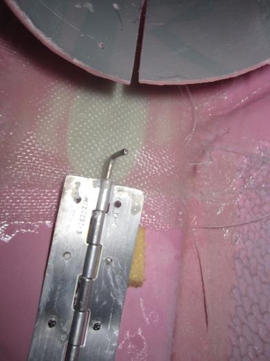Four layers of fiberglass on the interior of the cowl